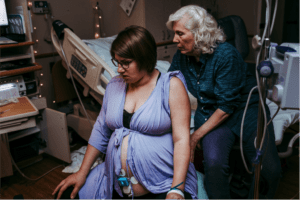 birth doula supporting a laboring mom