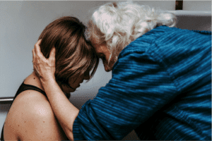 birth doula supporting mother