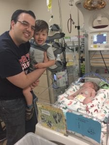 father with older son and Edison before infant loss
