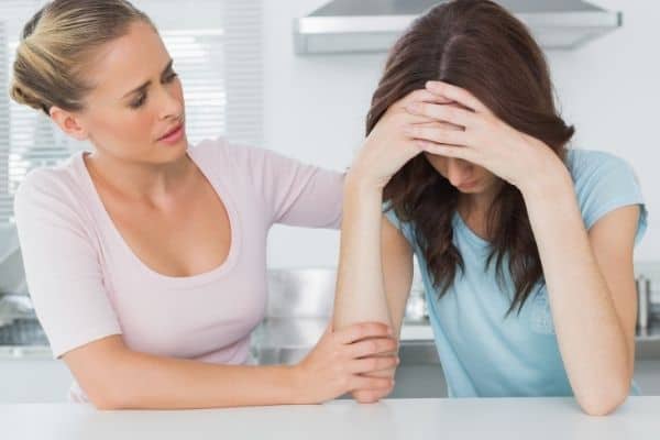 mom talking to a mom with anxiety